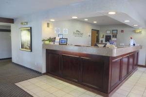 a lobby of a pharmacy with a reception counter at Baymont by Wyndham Boone in Boone