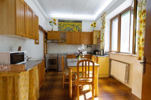 Kuchyň nebo kuchyňský kout v ubytování Casa Fabbrichina