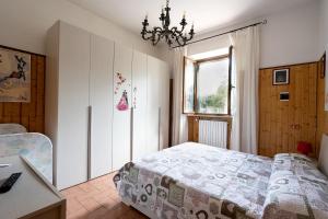 Postel nebo postele na pokoji v ubytování Casa Fabbrichina + 37 fotografií