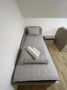 Postel nebo postele na pokoji v ubytování Apartman Ambijent + 18 fotografií