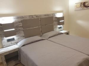 Ένα ή περισσότερα κρεβάτια σε δωμάτιο στο Denise Apartments