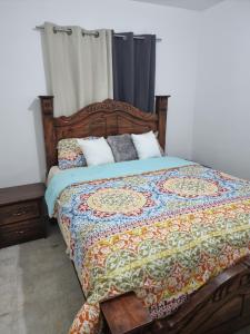 
Cama ou camas em um quarto em Dominican House
