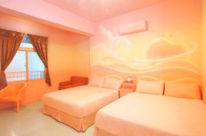 Letto o letti in una camera di 清清之家 DingDing Home