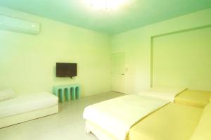Letto o letti in una camera di 清清之家 DingDing Home