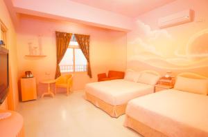 Letto o letti in una camera di 清清之家 DingDing Home