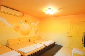 Letto o letti in una camera di 清清之家 DingDing Home