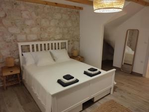 Postel nebo postele na pokoji v ubytování Villa Piscitelli