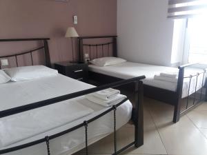 Letto o letti in una camera di Blue View
