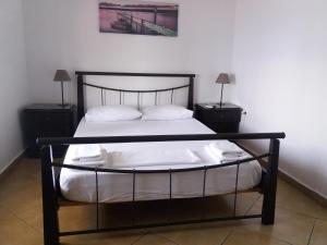 Letto o letti in una camera di Blue View
