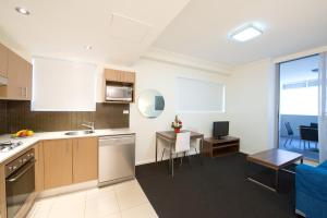 Una cocina o kitchenette en APX World Square