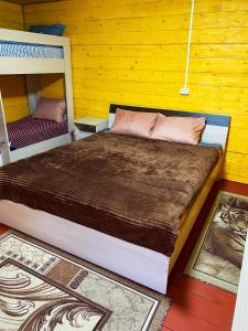 
Кровать или кровати в номере Туристическая База Сункар
