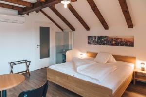 Ένα ή περισσότερα κρεβάτια σε δωμάτιο στο Hotel Müllerhof