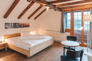 Ένα ή περισσότερα κρεβάτια σε δωμάτιο στο Hotel Müllerhof