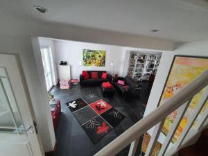 an aerial view of a living room with a couch at Ferienhaus Rosengarten in Selb