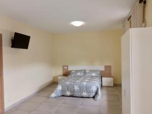Posteľ alebo postele v izbe v ubytovaní La Villa Hostal