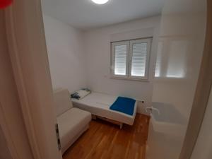 Posteľ alebo postele v izbe v ubytovaní Apartman u centru Makarske
