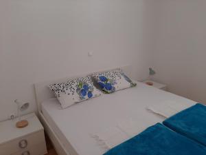 Posteľ alebo postele v izbe v ubytovaní Apartman u centru Makarske
