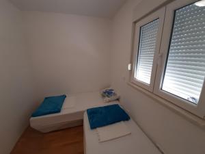 Posteľ alebo postele v izbe v ubytovaní Apartman u centru Makarske
