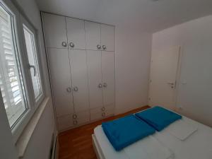 Posteľ alebo postele v izbe v ubytovaní Apartman u centru Makarske