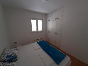 Posteľ alebo postele v izbe v ubytovaní Apartman u centru Makarske