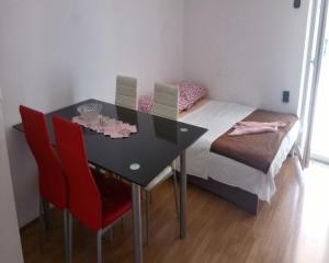 Postel nebo postele na pokoji v ubytování Apartmani Pucarin