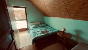 En eller flere senge i et værelse på Ubytovanie Taraj