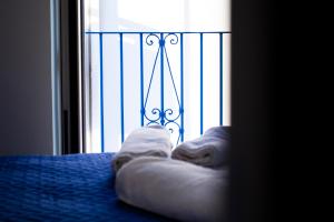 Postel nebo postele na pokoji v ubytování Pietracielo B&B
