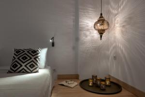 A bed or beds in a room at Astrea Villas
