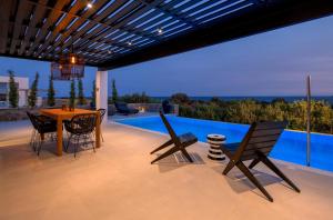 The swimming pool at or close to Astrea Villas
