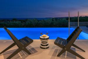 The swimming pool at or close to Astrea Villas