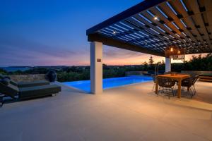 The swimming pool at or close to Astrea Villas