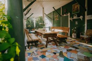 Reštaurácia alebo iné gastronomické zariadenie v ubytovaní Zacisze Leśne nad Pilicą