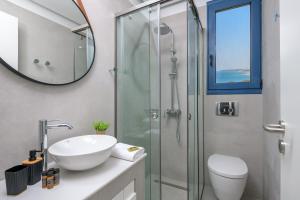 A bathroom at Astrea Villas