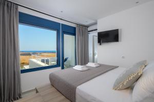 A bed or beds in a room at Astrea Villas Még 37 kép