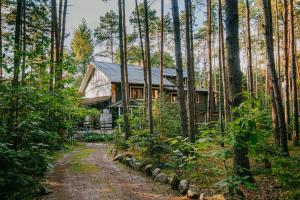 Vonkajšia záhrada v ubytovaní Zacisze Leśne nad Pilicą