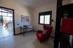Posedenie v ubytovaní Vivienda Vacacional Villa El Mirador