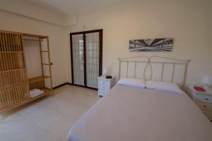 Posteľ alebo postele v izbe v ubytovaní Vivienda Vacacional Villa El Mirador