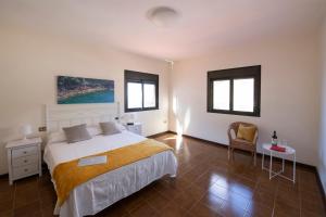 Posteľ alebo postele v izbe v ubytovaní Vivienda Vacacional Villa El Mirador
