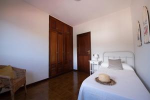Posteľ alebo postele v izbe v ubytovaní Vivienda Vacacional Villa El Mirador