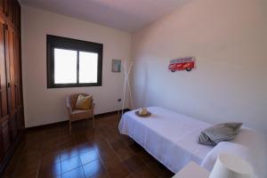 Posteľ alebo postele v izbe v ubytovaní Vivienda Vacacional Villa El Mirador