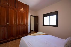 Posteľ alebo postele v izbe v ubytovaní Vivienda Vacacional Villa El Mirador