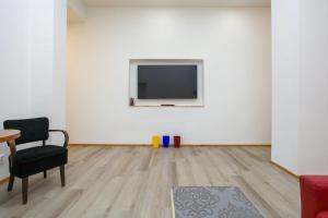 Televízia a/alebo spoločenská miestnosť v ubytovaní Luxusní velký apartmán s terasou v centru Litomyšle