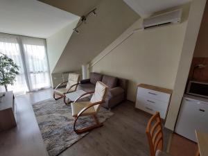 Posezení v ubytování Cserke Napfény Apartman