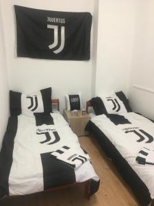 Posteľ alebo postele v izbe v ubytovaní Mátrai Vándor Apartmanok