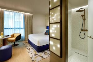 Posteľ alebo postele v izbe v ubytovaní Hard Rock Hotel Madrid
