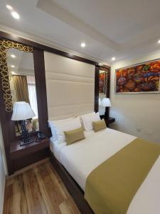 Tempat tidur dalam kamar di Goha Addis Hotel