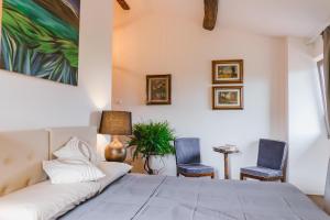 Postel nebo postele na pokoji v ubytování Agriturismo Le Fonti