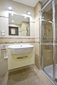 Un baño de Apartamenty Viva Tatry