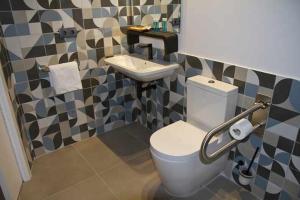 Koupelna v ubytování Mochorural home adaptado