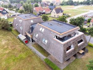 Bygningen som lejligheden ligger i + 7 billeder